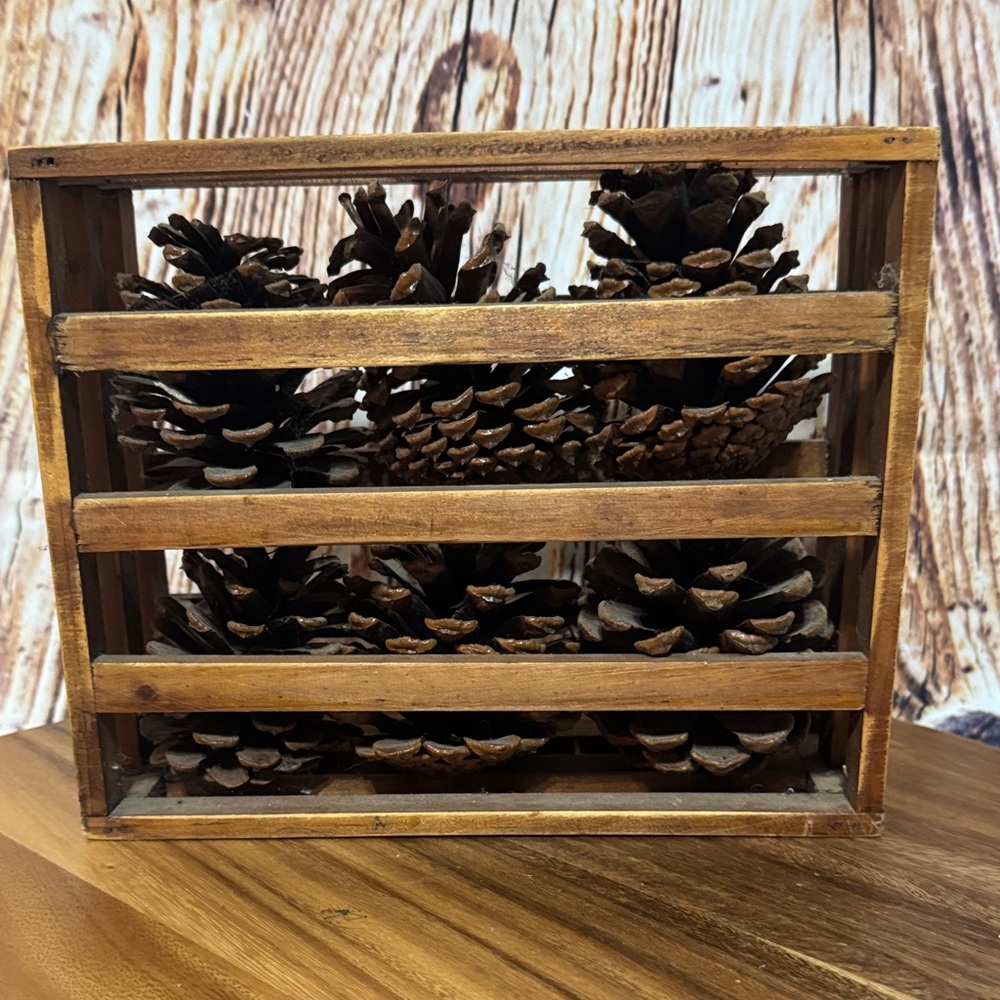 Rustic Wooden Crate with Pine Cones